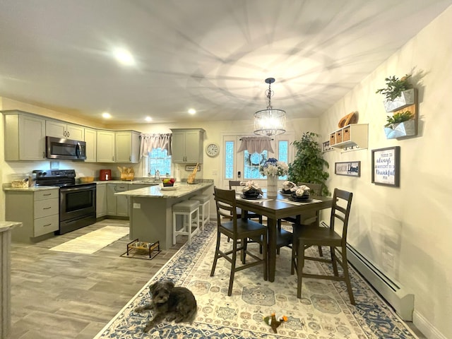 5 Willard Way, Raymond, ME 04071 - dining room featuring baseboard heating, plenty of natural light, recessed lighting, light wood finished floors, and baseboards