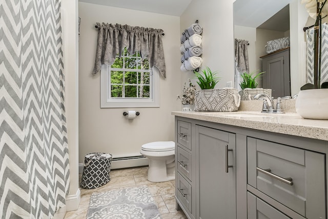 5 Willard Way, Raymond, ME 04071 - full bathroom with vanity, toilet, baseboard heating, and a shower with shower curtain