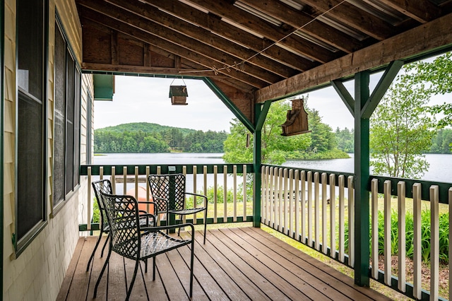 302 Spring St, Brownfield, ME 04010 - deck featuring a water view and a wooded view