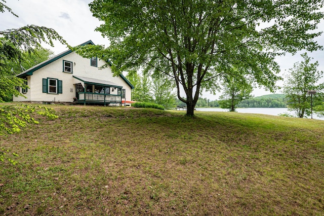 302 Spring St, Brownfield, ME 04010 - view of grassy yard featuring a deck with water view