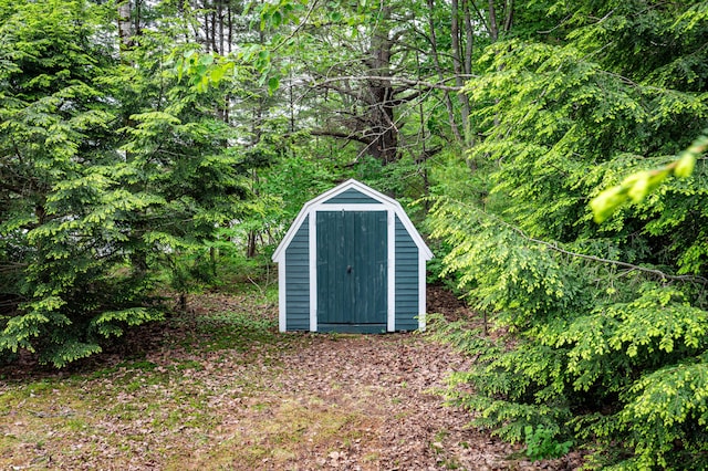 302 Spring St, Brownfield, ME 04010 - view of shed with a view of trees
