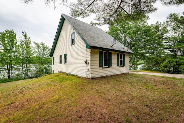 302 Spring St, Brownfield, ME 04010 - view of property exterior featuring a lawn and a shingled roof