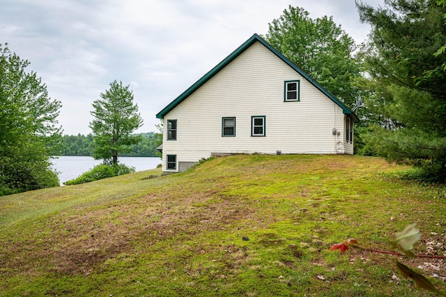 302 Spring St, Brownfield, ME 04010 - view of home's exterior with a water view and a lawn