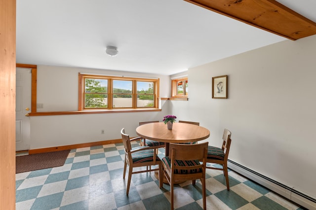 302 Spring St, Brownfield, ME 04010 - dining space featuring baseboard heating and tile patterned floors