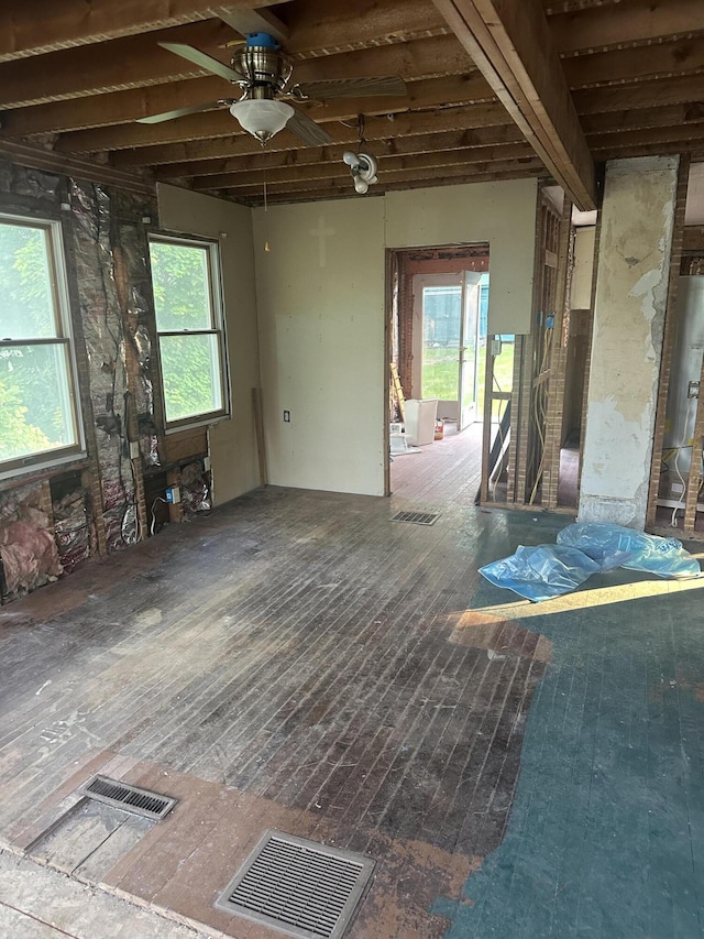 8 Lincoln St, Millinocket, ME 04462 - miscellaneous room featuring a ceiling fan and hardwood / wood-style floors