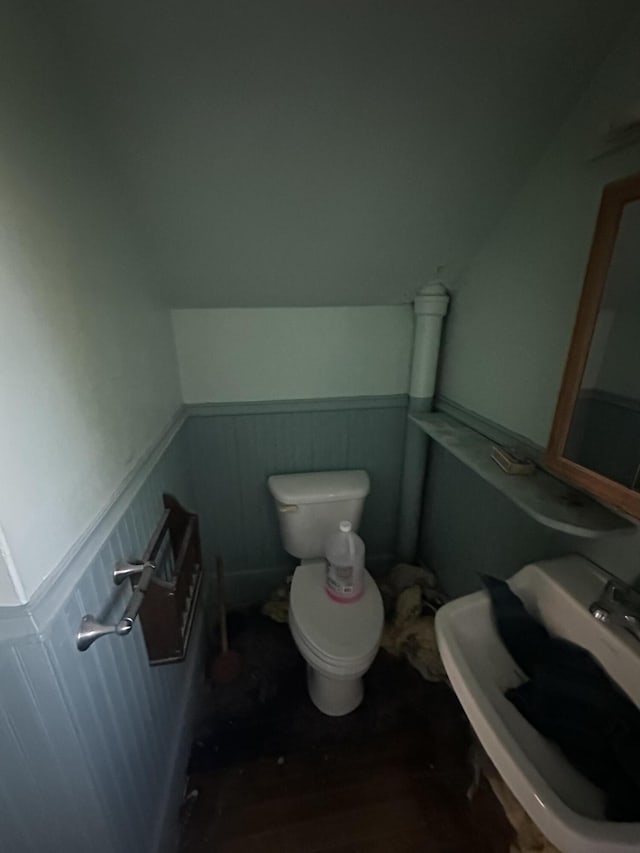 8 Lincoln St, Millinocket, ME 04462 - half bath with a sink and a wainscoted wall