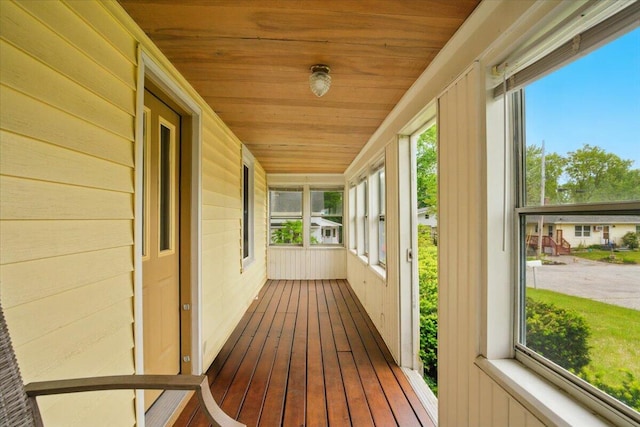 5 Jeffrey St, Lewiston, ME 04240 - unfurnished sunroom with wooden ceiling, plenty of natural light, hardwood / wood-style floors, and wood walls