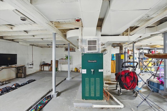 5 Jeffrey St, Lewiston, ME 04240 - unfinished basement featuring water heater