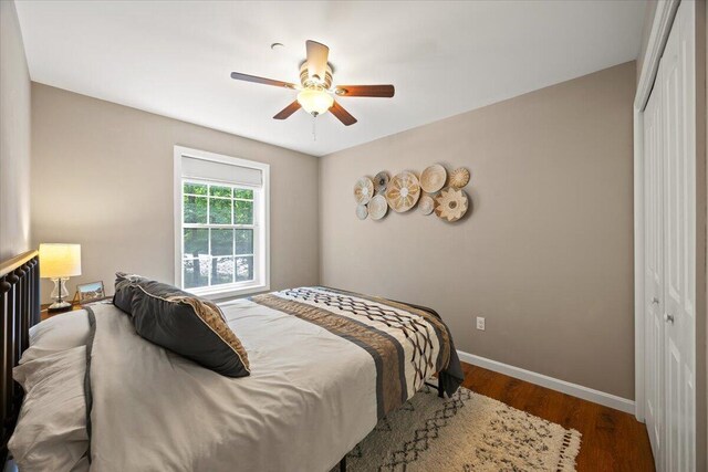 22 Fox Run Rd, Gray, ME 04039 - bedroom with a closet, wood finished floors, and a ceiling fan