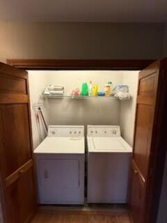 396 E Ridge Rd, Mars Hill, ME 04758 - laundry room featuring washing machine and clothes dryer and dark wood-style floors