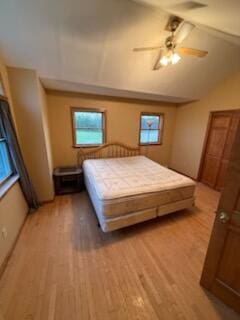 396 E Ridge Rd, Mars Hill, ME 04758 - bedroom featuring vaulted ceiling, light wood-style flooring, and ceiling fan