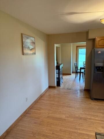 396 E Ridge Rd, Mars Hill, ME 04758 - kitchen with refrigerator with ice dispenser and light wood-style floors