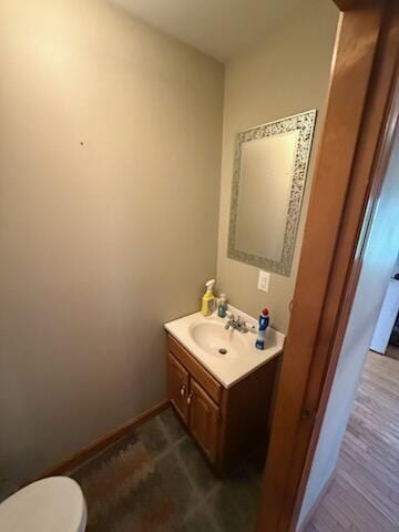 396 E Ridge Rd, Mars Hill, ME 04758 - bathroom with vanity and toilet