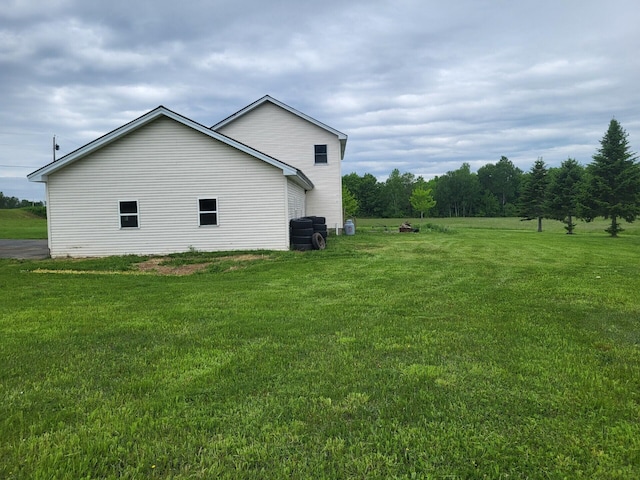 396 E Ridge Rd, Mars Hill, ME 04758 - view of side of property with a yard