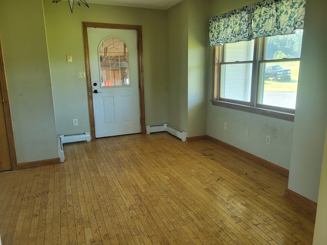 396 E Ridge Rd, Mars Hill, ME 04758 - entryway with baseboard heating and light wood-style floors