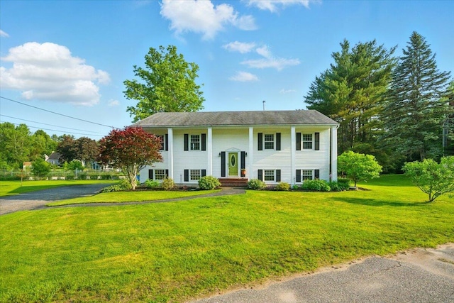 4 Hawthorne Pl, Lewiston, ME 04240 - raised ranch with a front yard