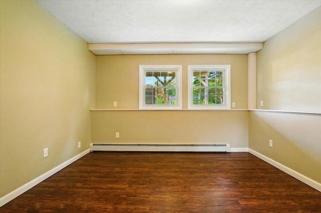 4 Hawthorne Pl, Lewiston, ME 04240 - unfurnished room featuring a baseboard heating unit, wood finished floors, and a textured ceiling