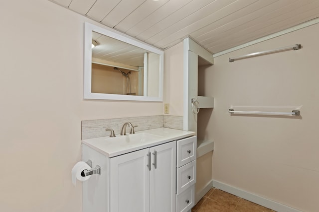 200 Main St, Freeport, ME 04032 - bathroom with vanity, tile patterned flooring, wooden ceiling, and tasteful backsplash