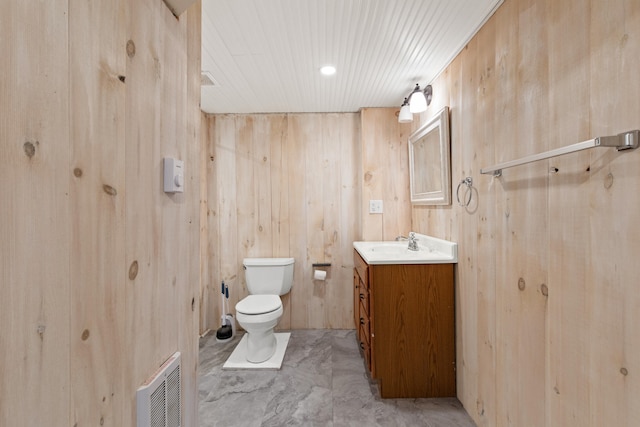 200 Main St, Freeport, ME 04032 - bathroom with vanity, wood walls, and wooden ceiling