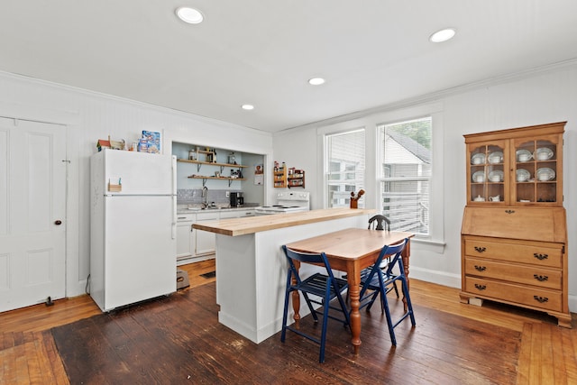 200 Main St, Freeport, ME 04032 - kitchen featuring white appliances, butcher block countertops, ornamental molding, dark wood-type flooring, and open shelves