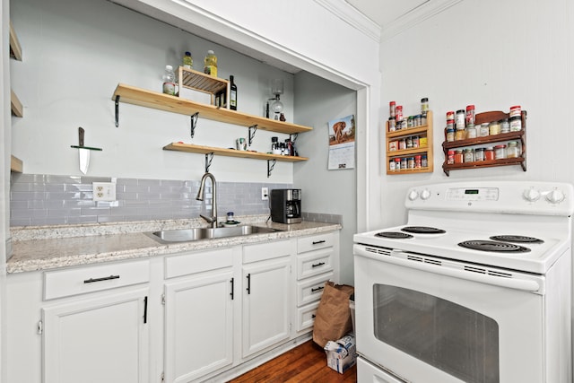 200 Main St, Freeport, ME 04032 - kitchen with electric range, crown molding, decorative backsplash, open shelves, and dark wood finished floors