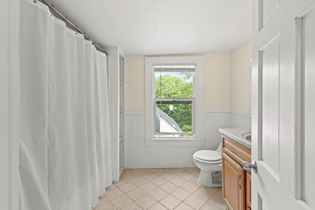 200 Main St, Freeport, ME 04032 - full bathroom with vanity, a wainscoted wall, tile patterned flooring, and curtained shower