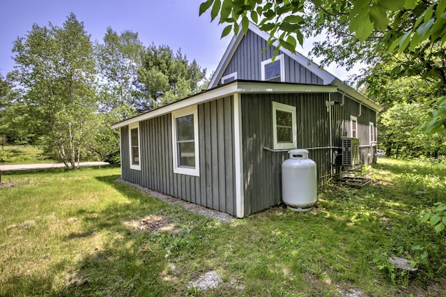 6 Meadow Ln, Sabattus, ME 04280 - view of side of home with a lawn and board and batten siding