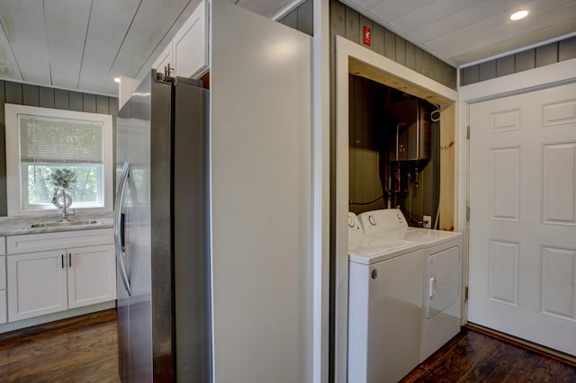 6 Meadow Ln, Sabattus, ME 04280 - washroom featuring washer and clothes dryer, dark wood-style flooring, wood walls, and recessed lighting