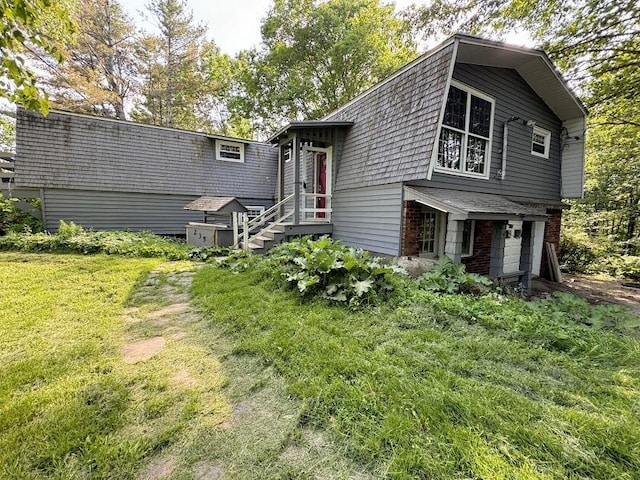 235 S Reynolds Rd, Winslow, ME 04901 - back of property with brick siding