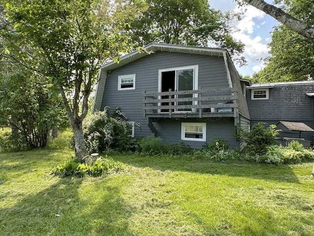 235 S Reynolds Rd, Winslow, ME 04901 - rear view of house with a gambrel roof and a yard
