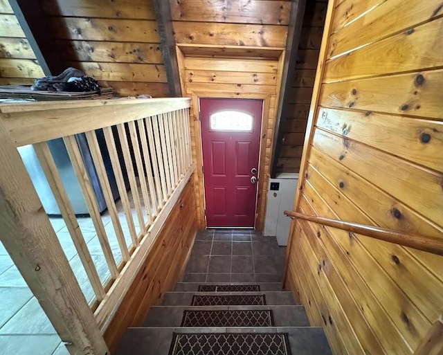 235 S Reynolds Rd, Winslow, ME 04901 - staircase with tile patterned floors and wood walls