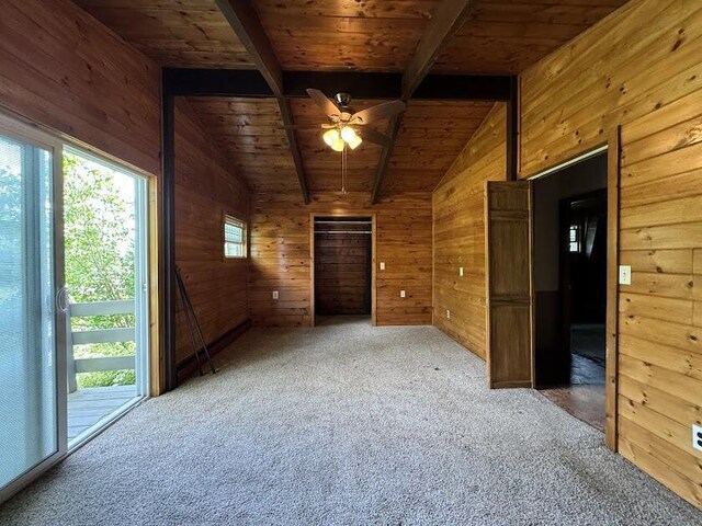 235 S Reynolds Rd, Winslow, ME 04901 - empty room with wooden ceiling, wood walls, carpet flooring, and ceiling fan