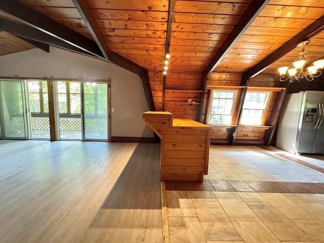 235 S Reynolds Rd, Winslow, ME 04901 - kitchen featuring stainless steel refrigerator with ice dispenser, plenty of natural light, a chandelier, wood ceiling, and decorative light fixtures