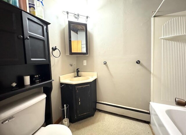 235 S Reynolds Rd, Winslow, ME 04901 - bathroom with a baseboard heating unit and vanity