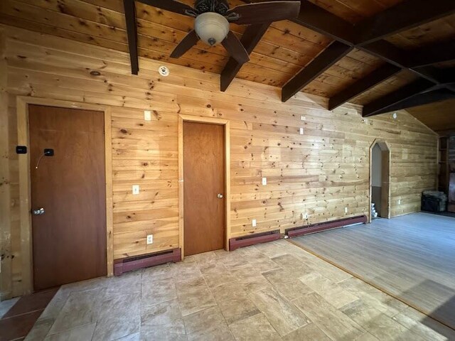 235 S Reynolds Rd, Winslow, ME 04901 - unfurnished living room featuring wood ceiling, a ceiling fan, wood walls, and arched walkways