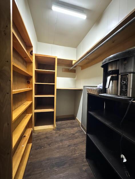 235 S Reynolds Rd, Winslow, ME 04901 - walk in closet with dark wood-style floors