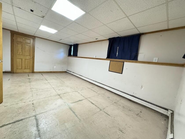 235 S Reynolds Rd, Winslow, ME 04901 - empty room with a paneled ceiling and a baseboard heating unit
