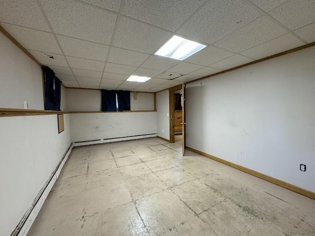 235 S Reynolds Rd, Winslow, ME 04901 - finished below grade area with a baseboard heating unit and a paneled ceiling