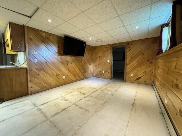 235 S Reynolds Rd, Winslow, ME 04901 - spare room featuring a drop ceiling and wood walls