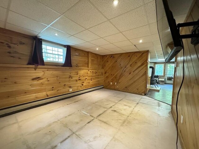 235 S Reynolds Rd, Winslow, ME 04901 - empty room featuring wood walls and a paneled ceiling