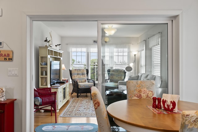 10 Barefoot Cottage Rd Unit 124, Wells, ME 04090 - dining room featuring wood finished floors