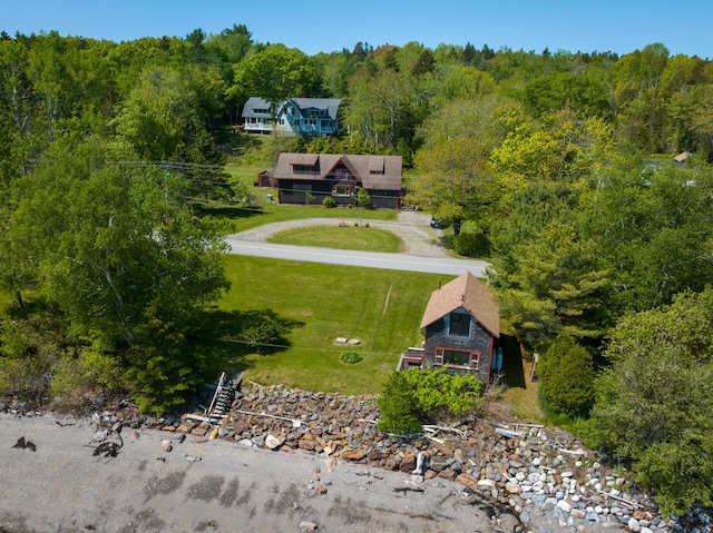 364 Main Rd, Islesboro, ME 04848 - aerial view of property and surrounding area featuring a heavily wooded area