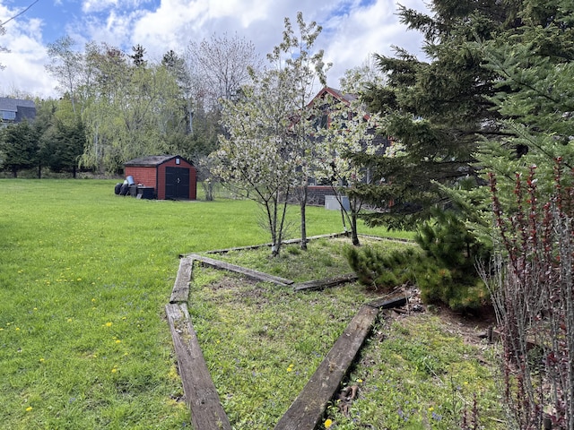 364 Main Rd, Islesboro, ME 04848 - view of green lawn featuring a storage unit