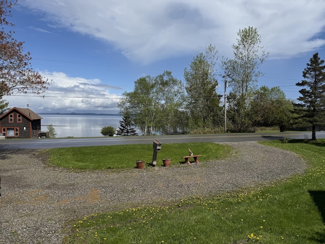 364 Main Rd, Islesboro, ME 04848 - view of home's community with a water view and a lawn