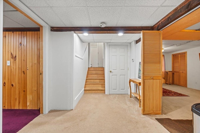 182 Myrtle St, Westbrook, ME 04092 - hall featuring carpet flooring, stairs, a drop ceiling, and wooden walls