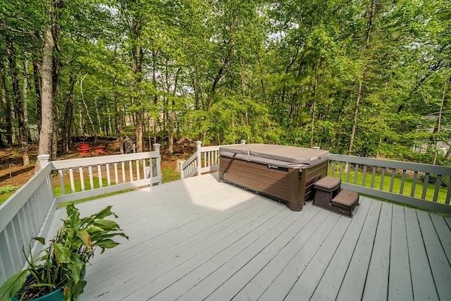 82 Eaton Ridge Dr, Holden, ME 04429 - wooden deck with a hot tub