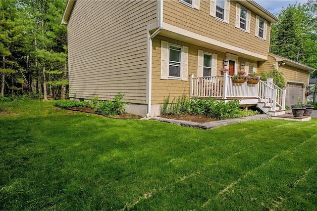 82 Eaton Ridge Dr, Holden, ME 04429 - view of front of home with a front lawn and an attached garage