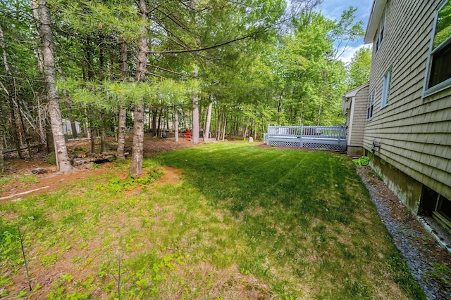 82 Eaton Ridge Dr, Holden, ME 04429 - view of green lawn featuring a wooden deck