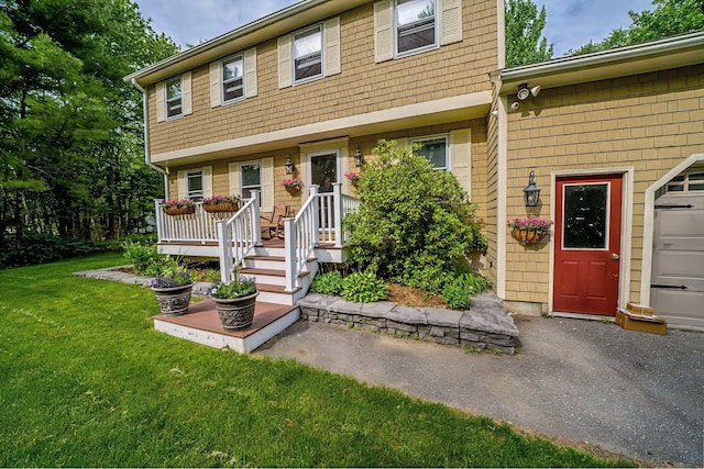 82 Eaton Ridge Dr, Holden, ME 04429 - view of front of house with a front yard