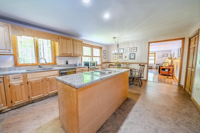 82 Eaton Ridge Dr, Holden, ME 04429 - kitchen featuring appliances with stainless steel finishes, a center island, light stone counters, decorative light fixtures, and a chandelier